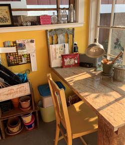 Welcome to my puttering shed. There is my garden journal front and center with everything I need to keep me organized while smiling.