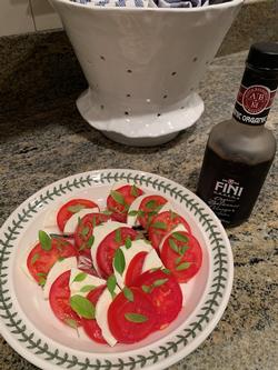 Enjoy a simple but glorious salad of sliced tomatoes, fresh mozzarella & homegrown lemon basil. Drizzle with balsalmic vinegar. Photo: David S. Walker