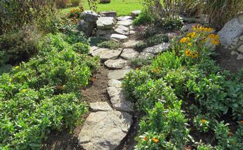 Use permeable materials to slow water flow, spread it out, and allow it to sink in. Photo: PxHere