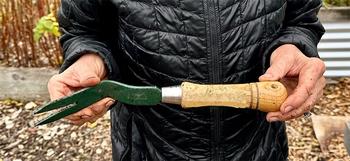 This specialized tool for deep-rooted weeds is a favorite of one of the Edible Garden volunteers.